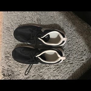 Black & white Nike Roshes