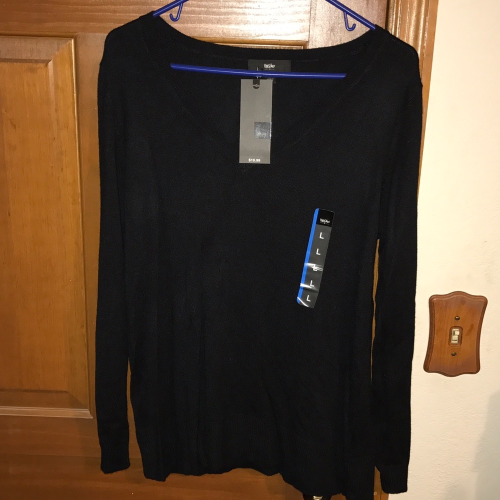 Long sleeved black v-neck sweater