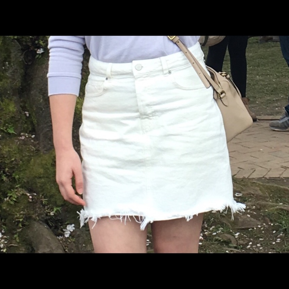 White denim ripped mini skirt