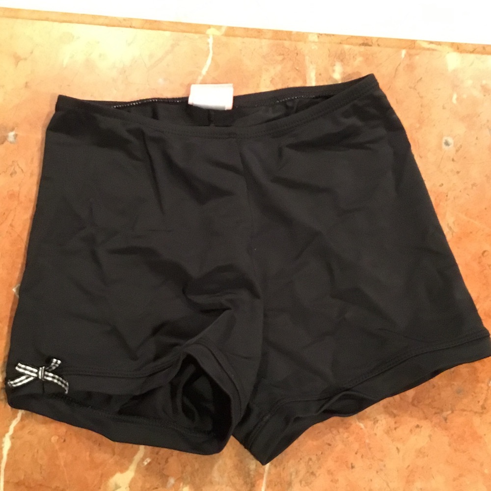Black spandex with bows on sides
