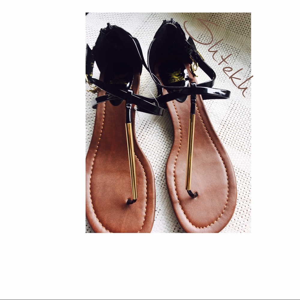 NWOTGS SHETKH BLACK AND GOLD SANDALS