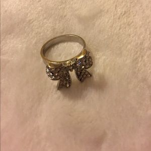 Silver color medium size jeweled bow ring