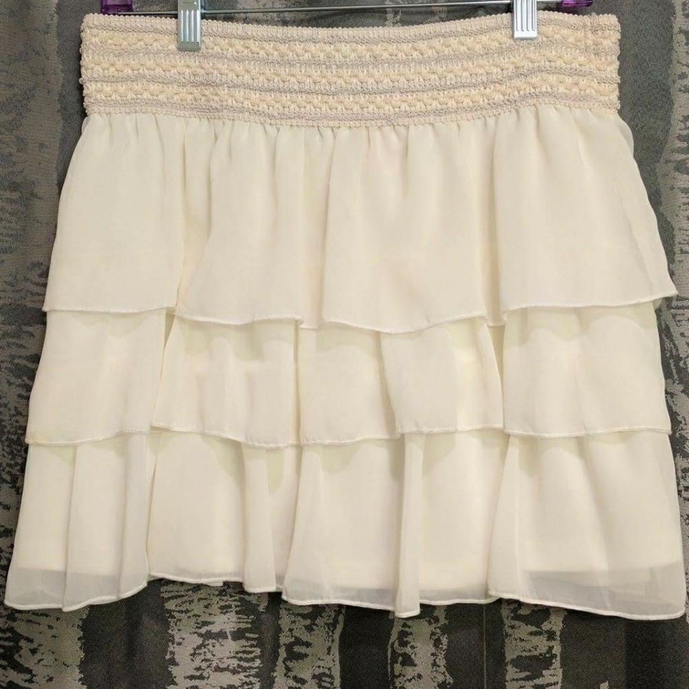 White-frilly mini skirt