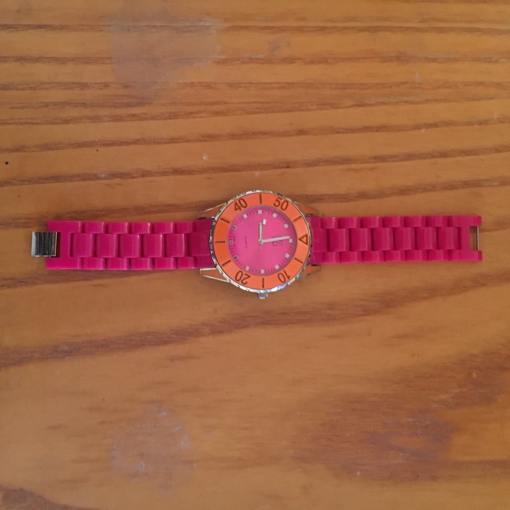 Pink watch with rubber bracelet
