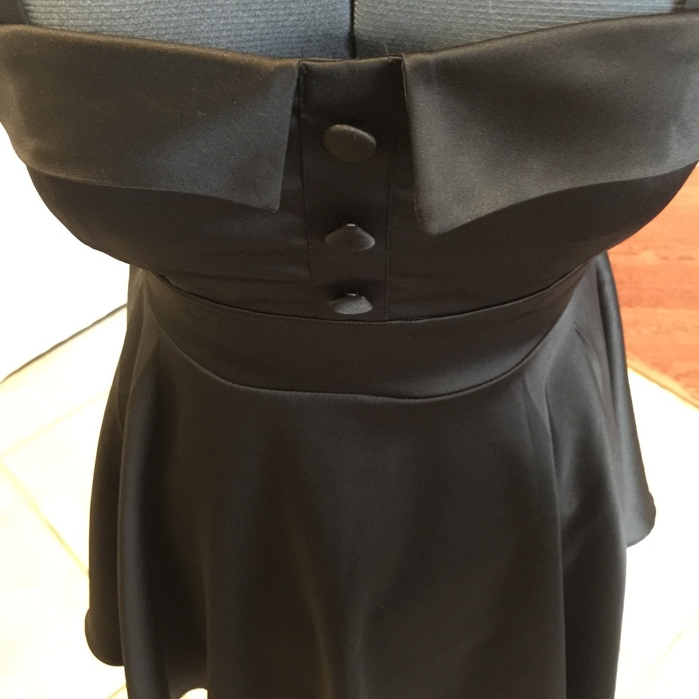 This is a forever 21 black size S dress.