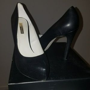 Black leather pumps (worn once)