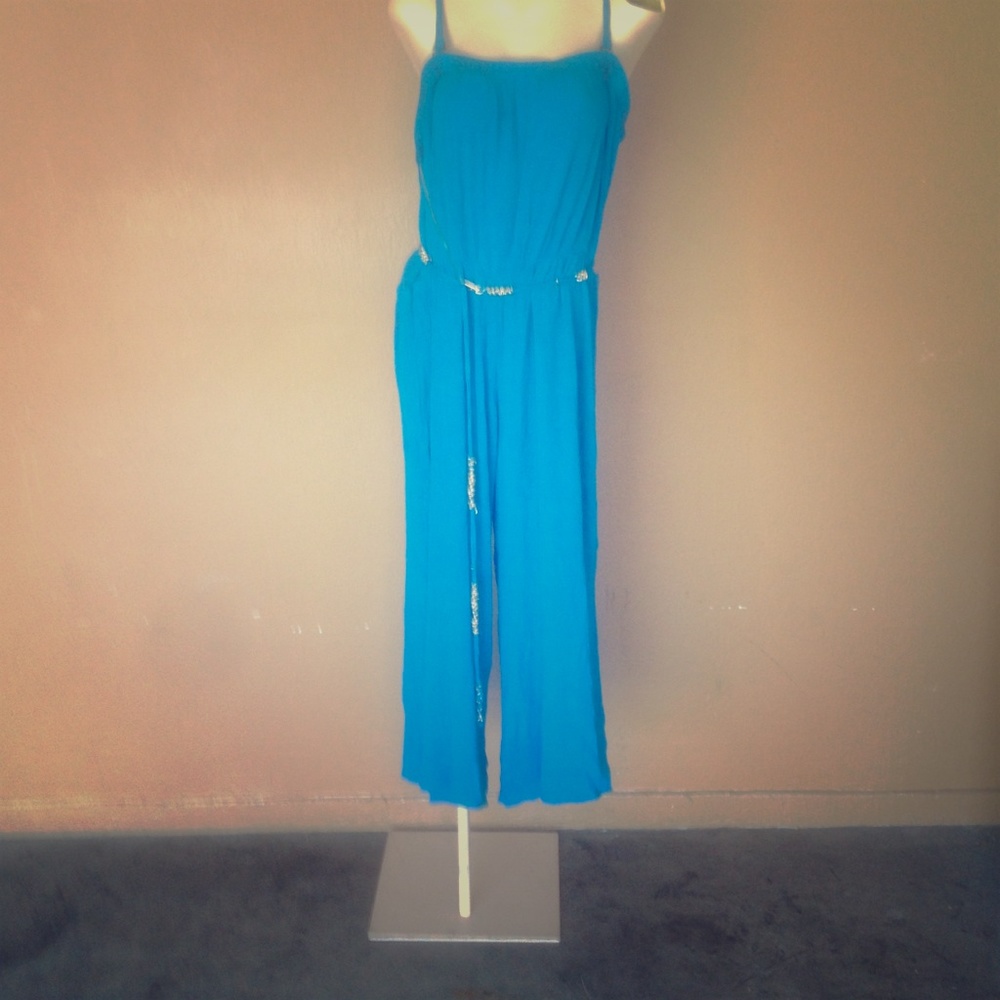 Ashley Stewart. Blue jump suit with belt
