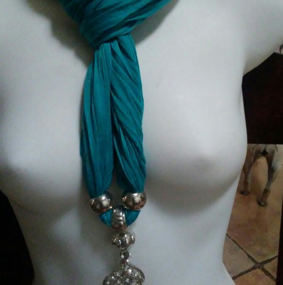 Scarf with leaf jewelry