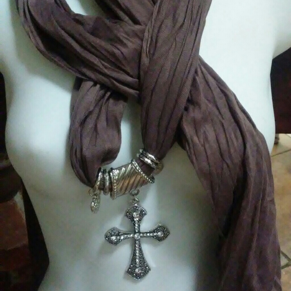 Scarf with cross jewelry