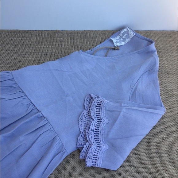 Our Emerson cut out blouse will make you feel - Picture 2 of 3