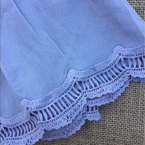 Our Emerson cut out blouse will make you feel - Picture 3 of 3