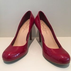 Shiny red pumps