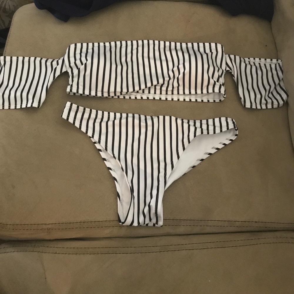 Bathing suit. NEVER WORN