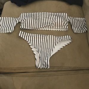 Bathing suit. NEVER WORN