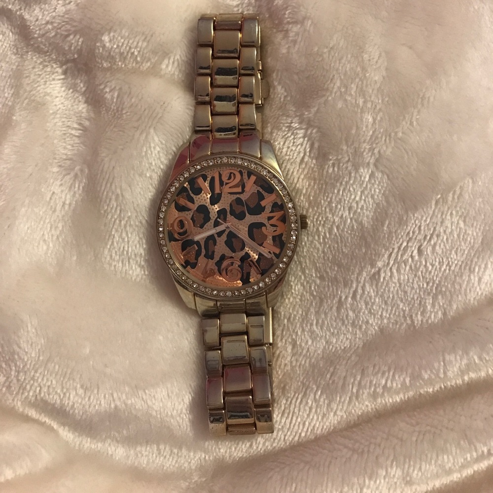Gold and leopard watch