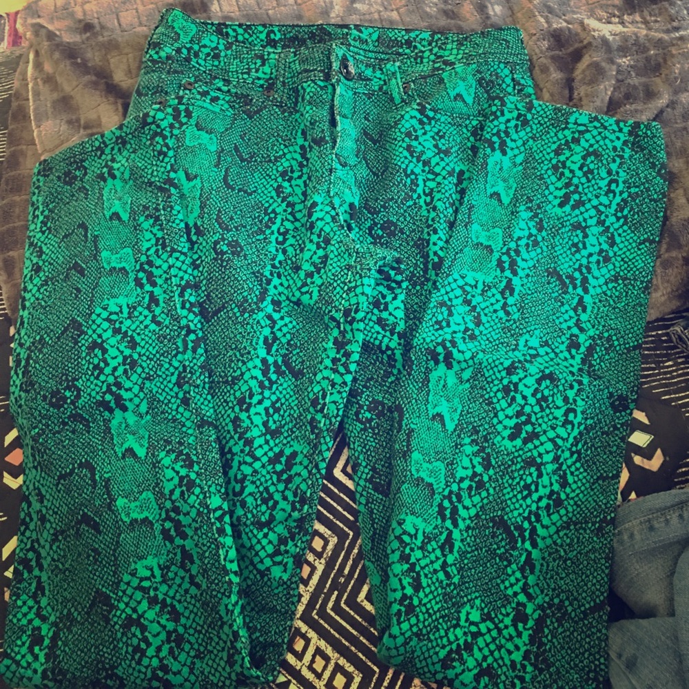 Justice green and black snake print skinny jeans