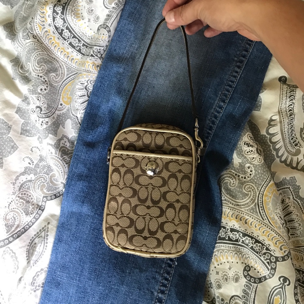 Coach electronic holder