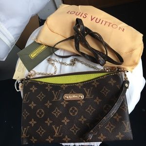 Louis Vuitton cross body clutch received as gift