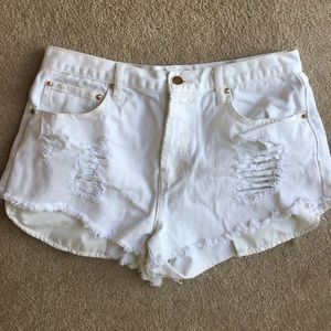 White ripped jean shorts