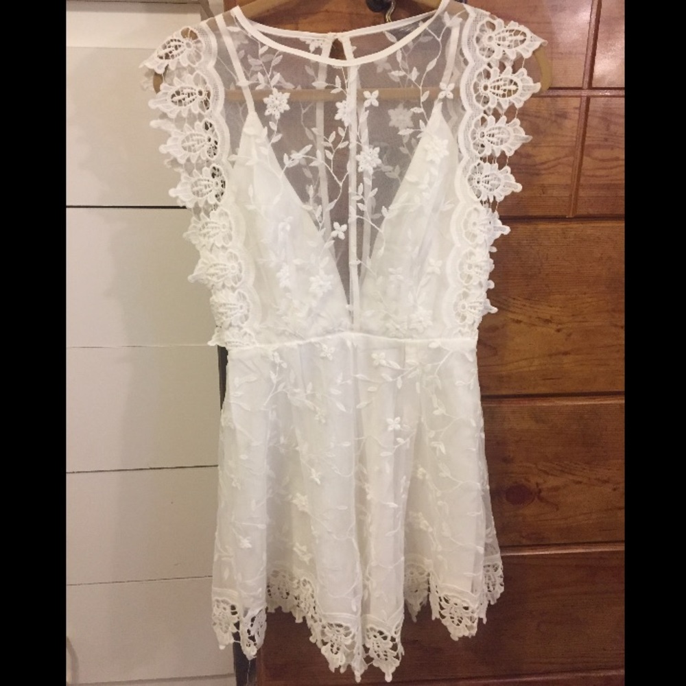 White lace romper. Never worn and NWT!