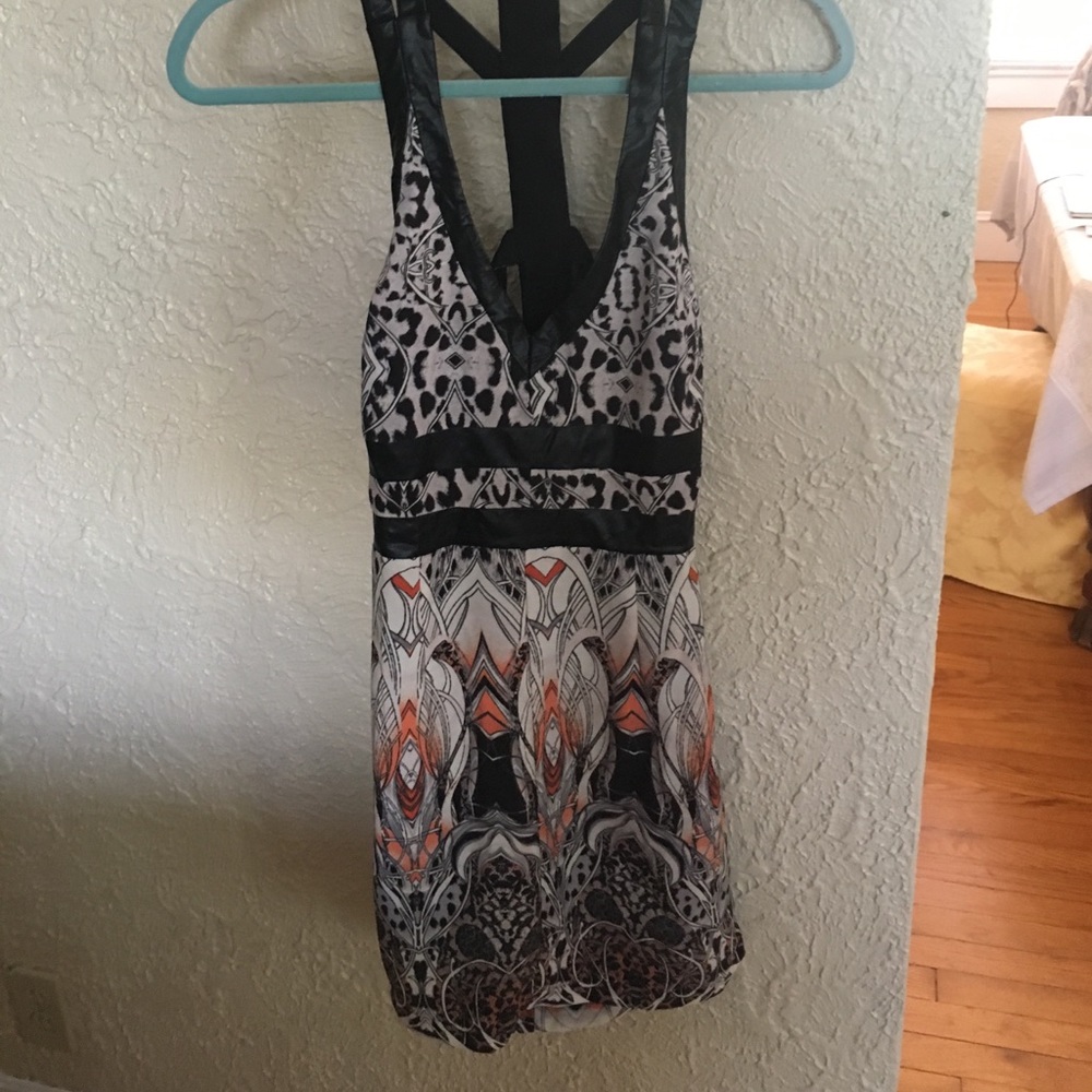 Akira Dress Tribal print leather trim.