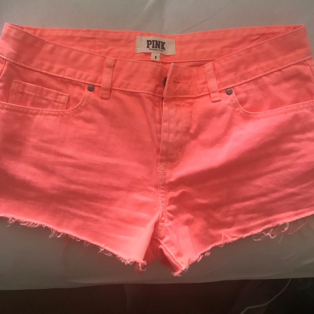 Bright orange short shorts