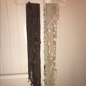 Lace scarves. fringe bottoms. triangle shape.