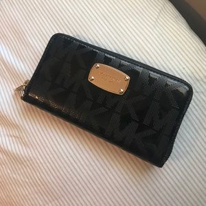 black with gold accent Michael Kors wallet