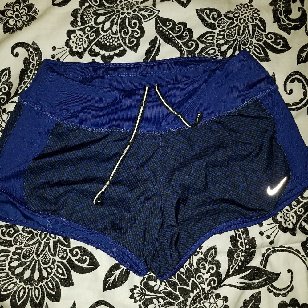 Nike Dri-Fit running shorts.