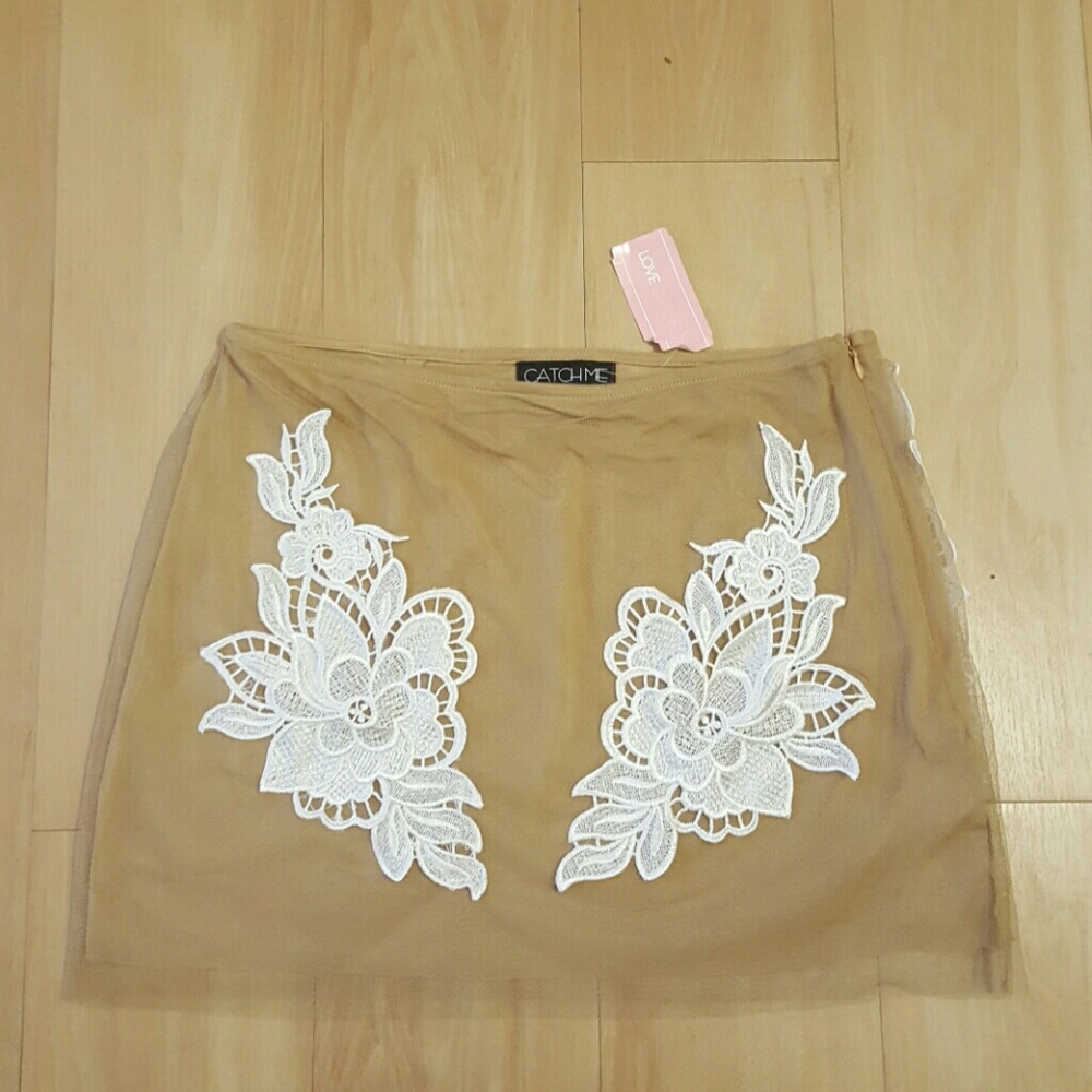 Nude skirt with mesh overlay