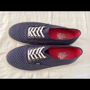 Navy blue w/ white polka dots Vans