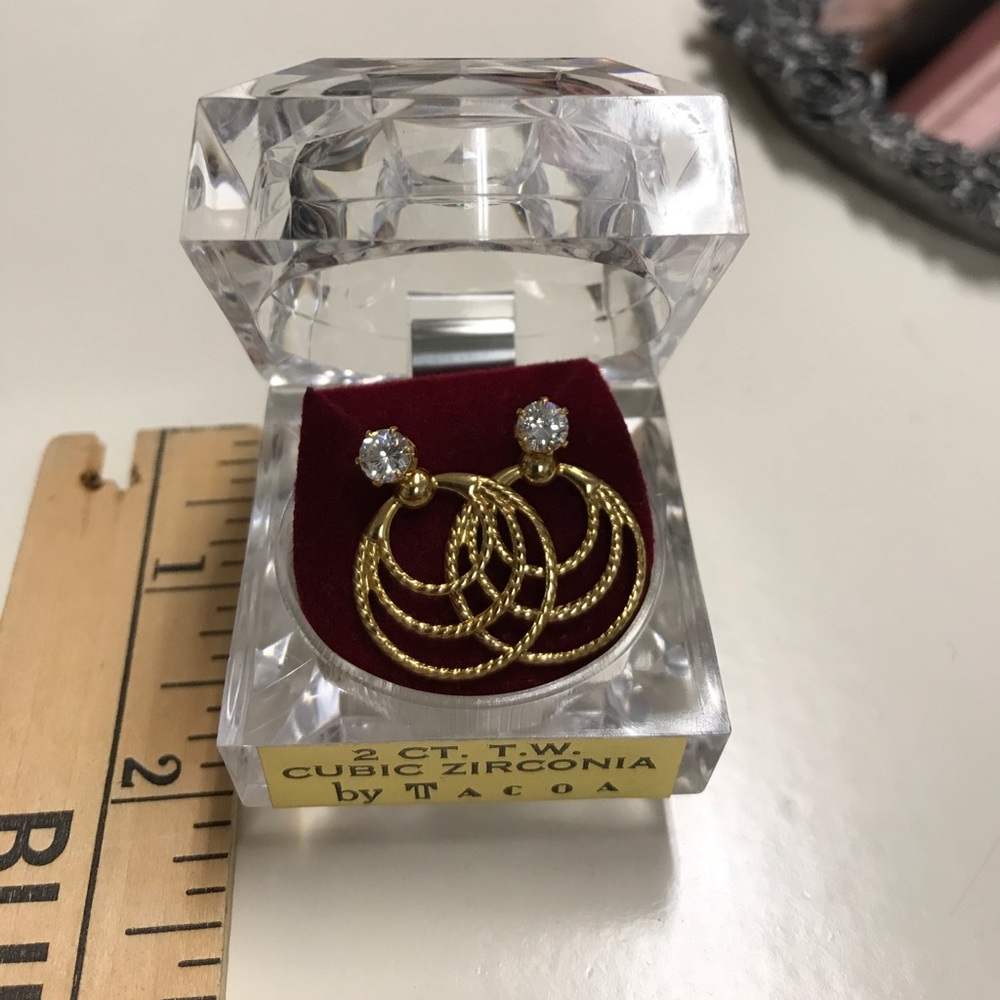 2 carat cubic zirconia and gold earrings.