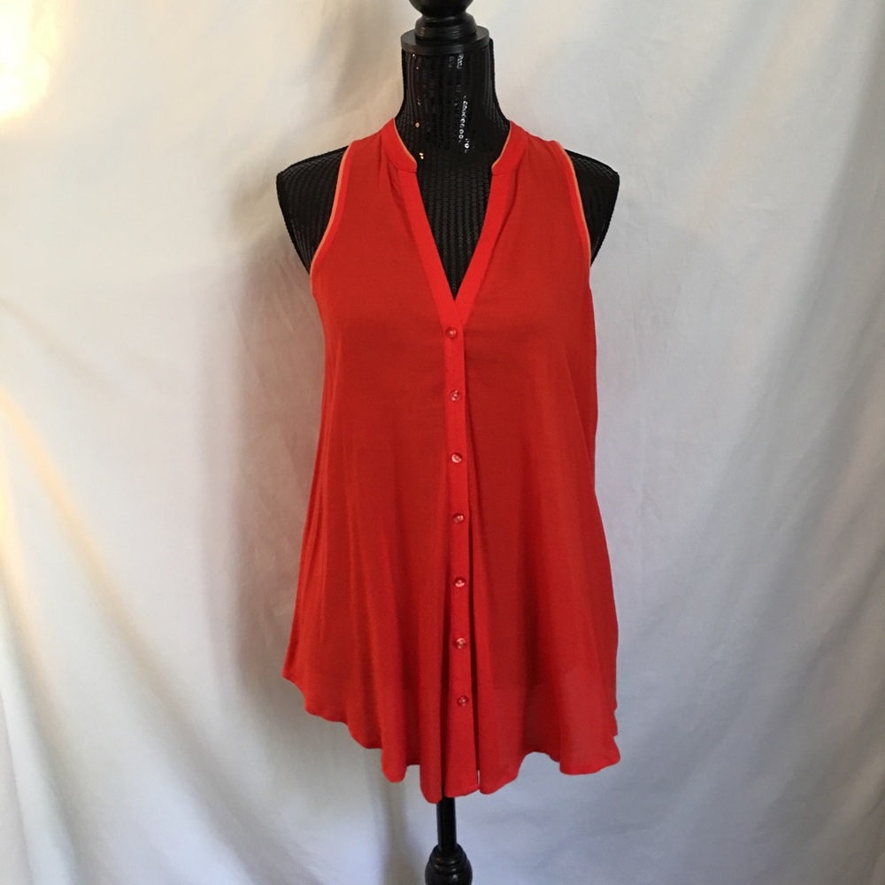 Orange top "MAEVE", size 2 rayon, small stain.