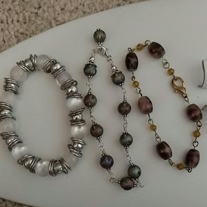 Set of 3 beaded bracelets.