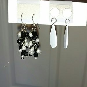 Set of black and white earrings.