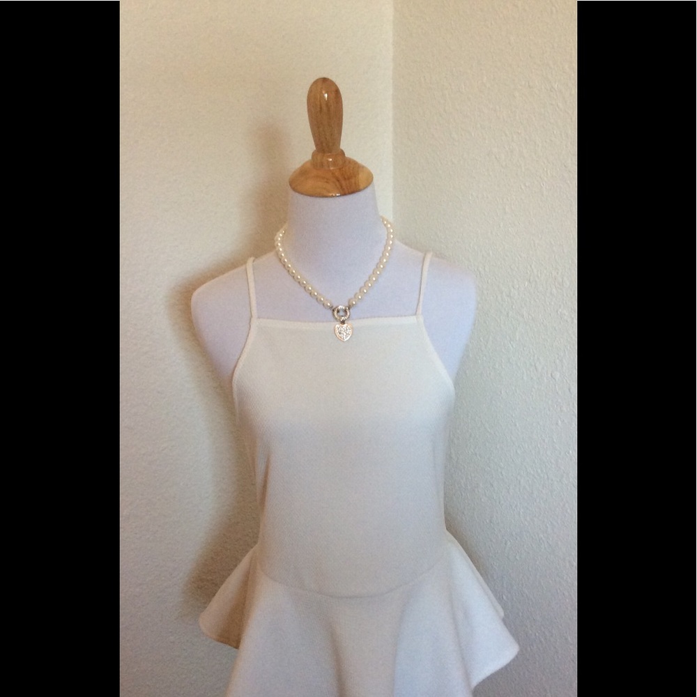 Adorable dressy tank by Cope.