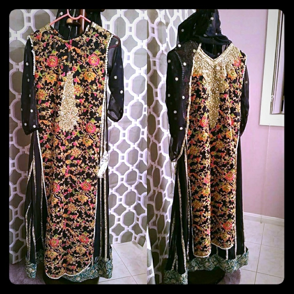 A beautiful, heavy black and multi colored dress