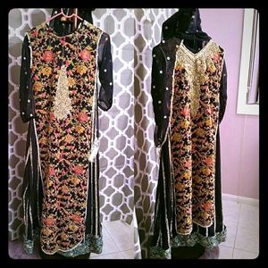 A beautiful, heavy black and multi colored dress