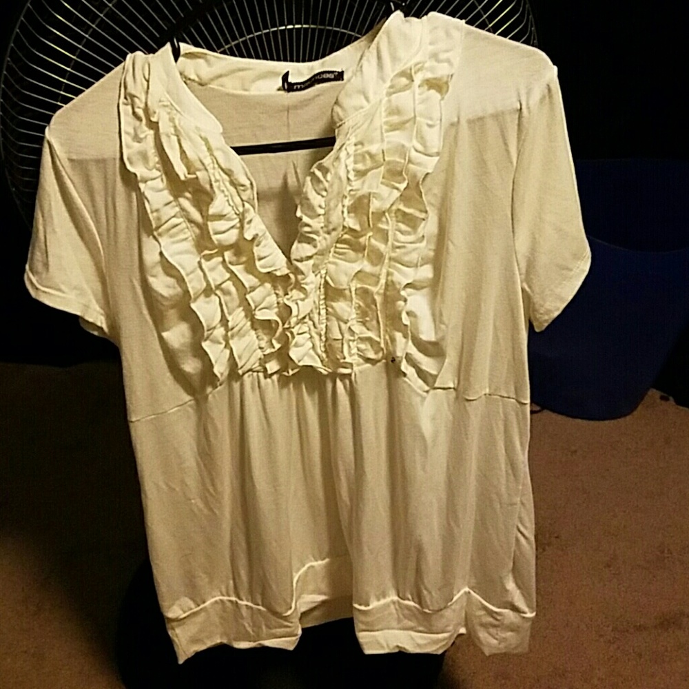 White blouse with ruffles on top