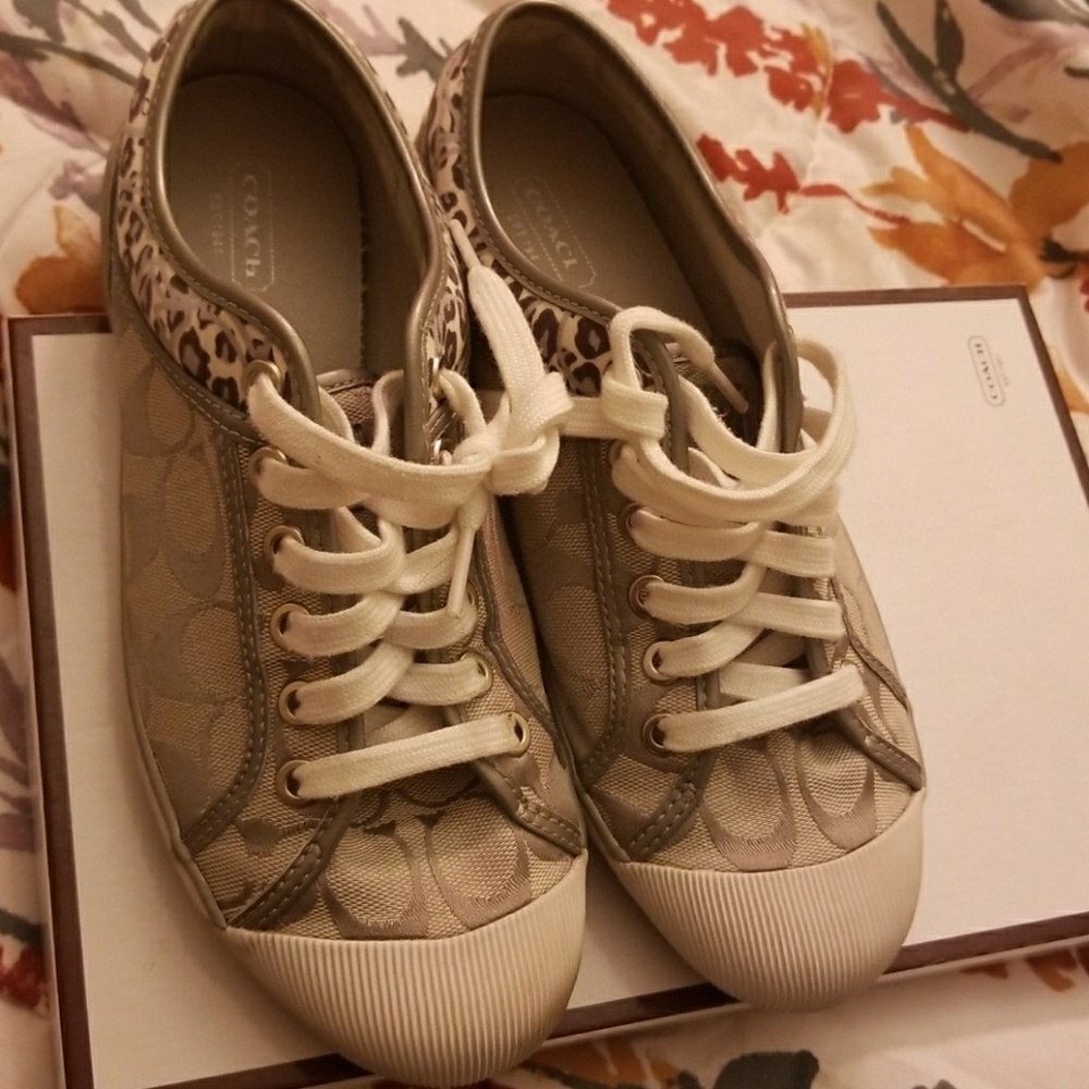 Silver and white comfy Coach sneakers