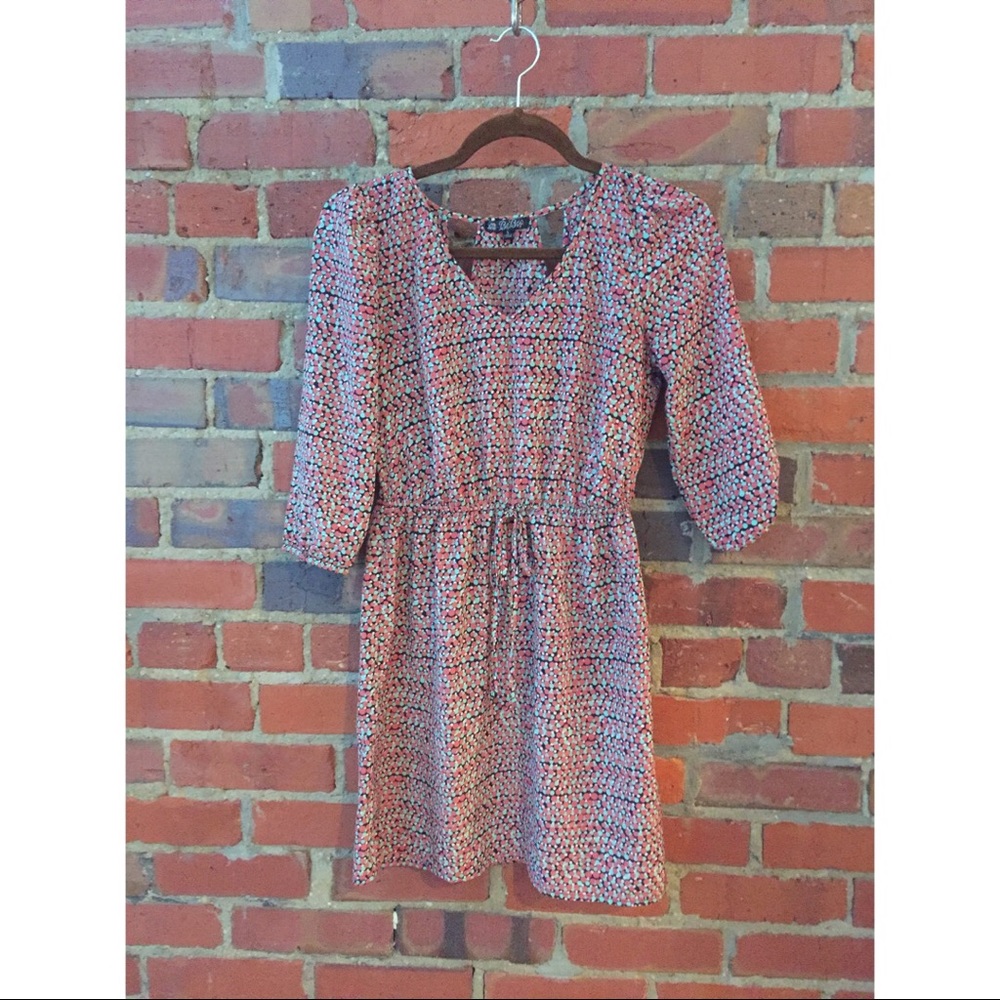 Cute summer dress with a modest pickaboo back.
