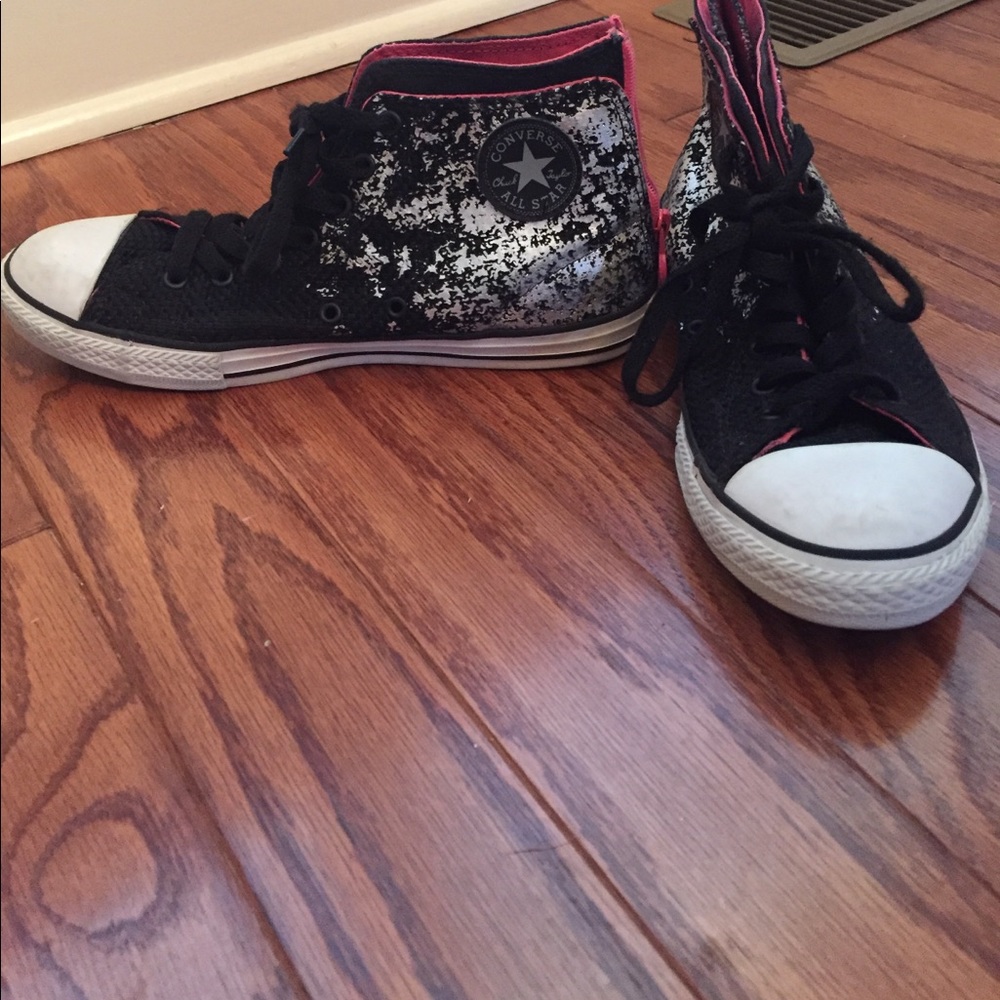 Pink and black converse