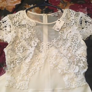 WHITE IN STYLE DRESS