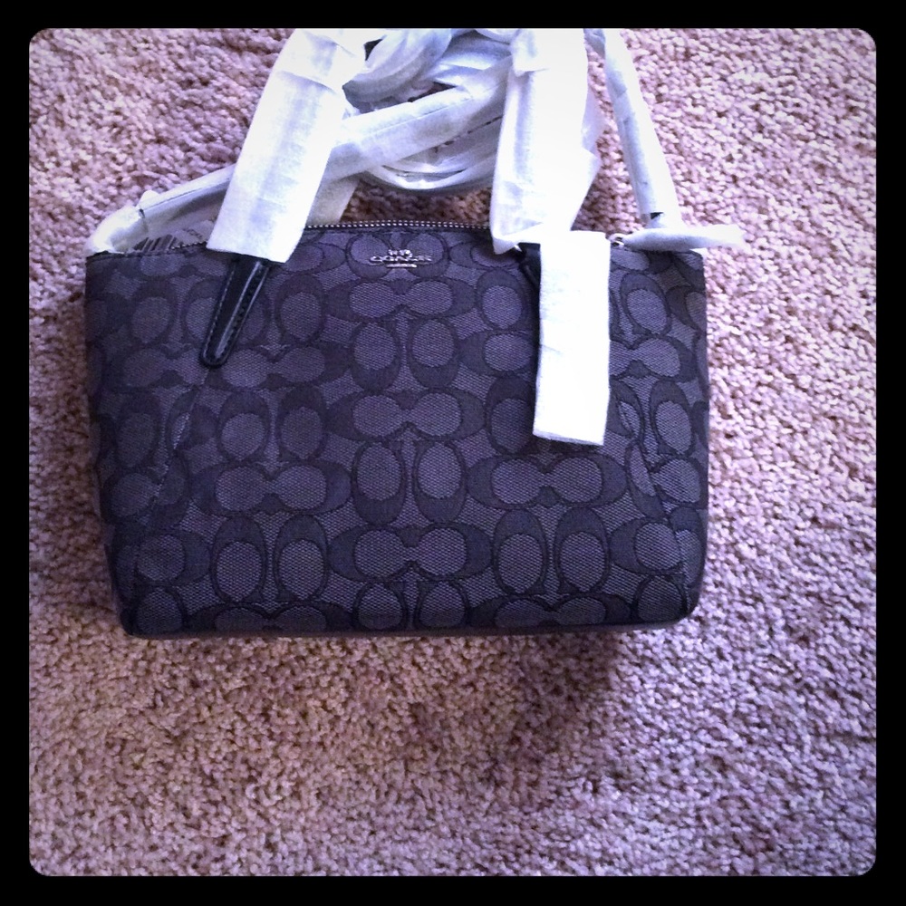 Brand new Coach Signature Mini Kelsey bag