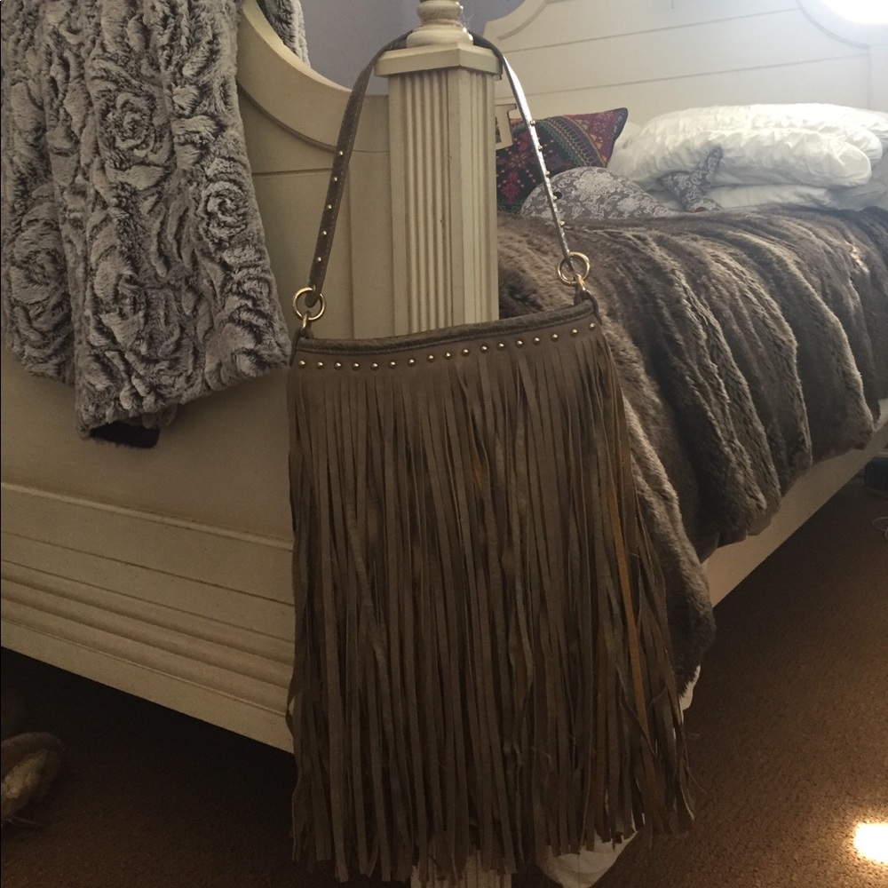 Distressed fringe shoulder bag