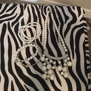 Sparkly pearl necklace and bracelets