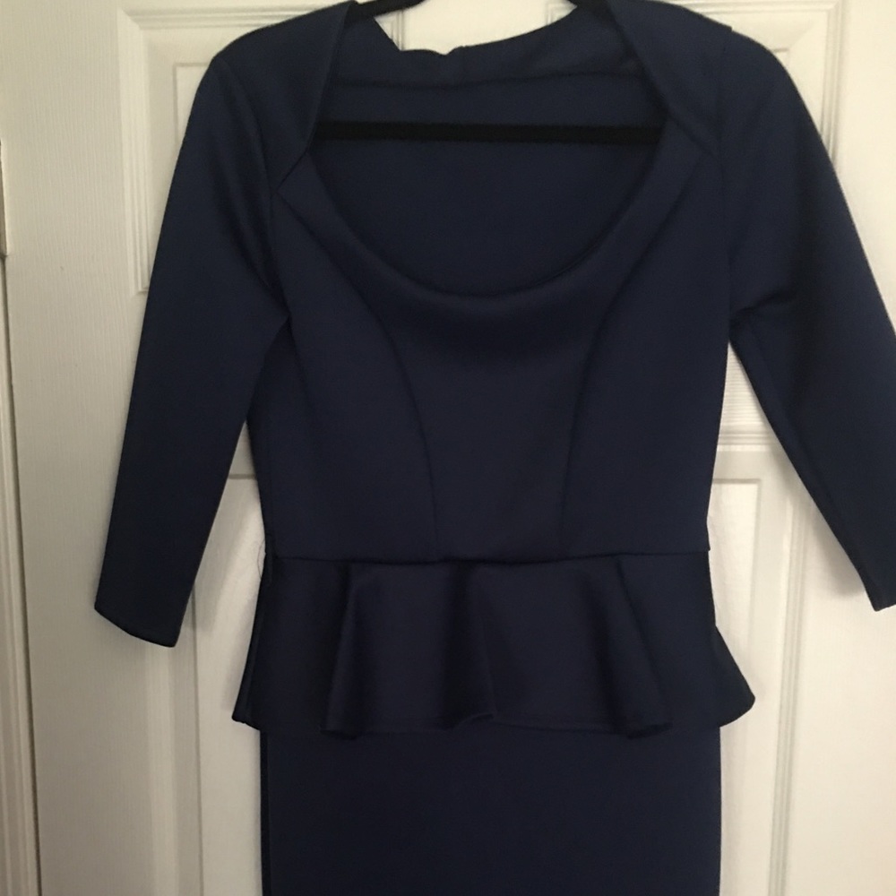 Classy navy blue 3 quarter sleeve Peplum Dress.