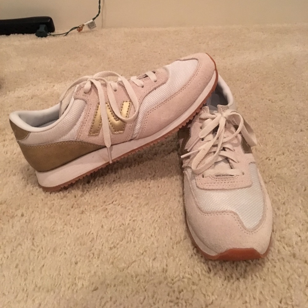 gold new balance sneakers