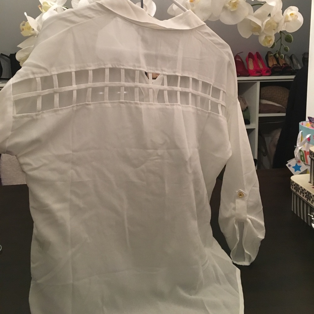 White blouse with back cutouts