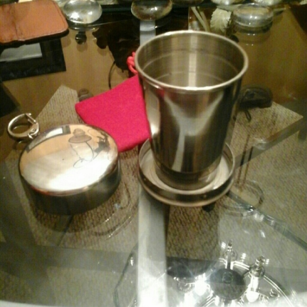 It is back stainless steel shot cup